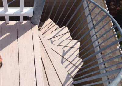 picture looking down a spiral staircase on a roof deck