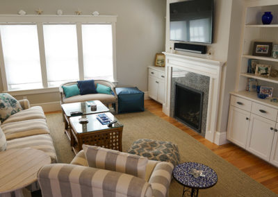 picture of a living room with a fire place and T.V.- ocean getaway