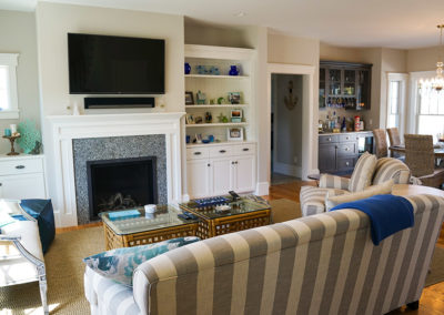 picture of a living room with a fire place and T.V.- ocean getaway