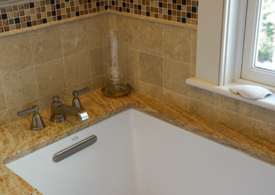 picture of granite bathtub with tile walls- cape seashore home
