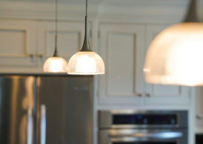 picture of hanging kitchen light fixtures- cape seashore home
